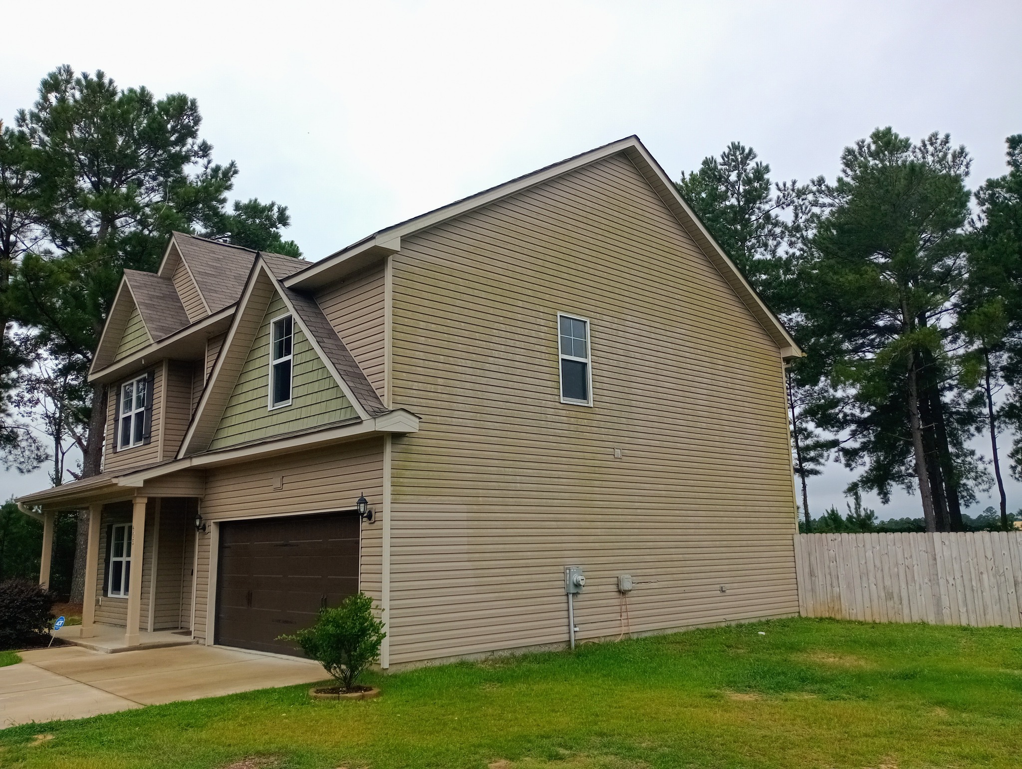 House exterior before pressure washing